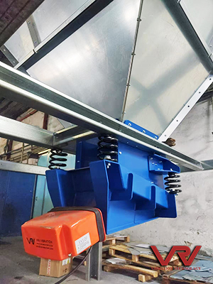 Electromagnetic vibrating feeder